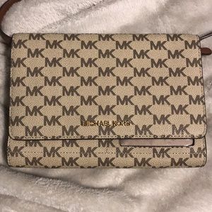 Michael Kors crossbody. 8 inches x  6 inches.